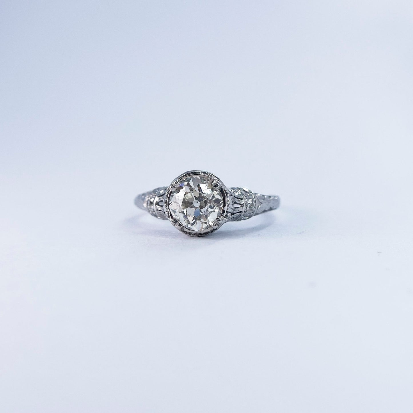 1920s Platinum Rose Cut Diamond Halo Ring with Old Cut Diamond Accents