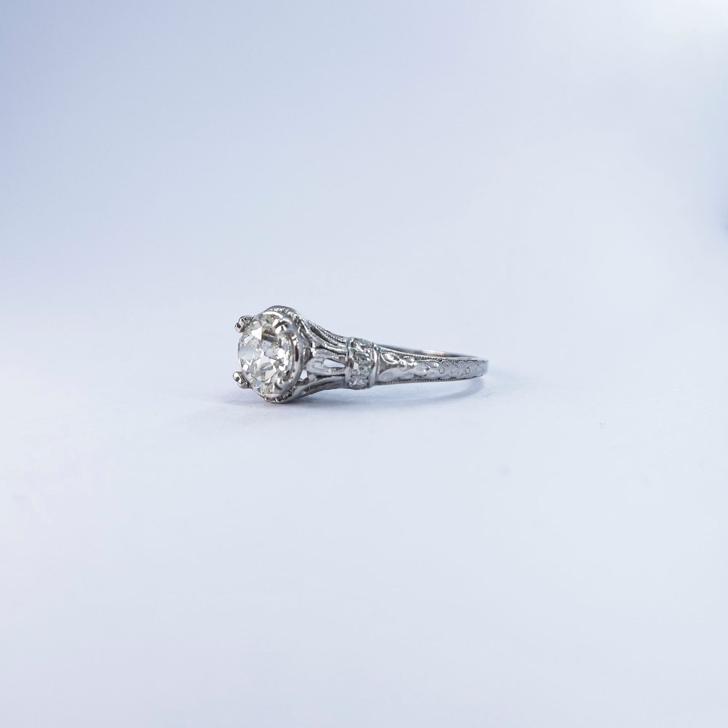 1920s Platinum Rose Cut Diamond Halo Ring with Old Cut Diamond Accents