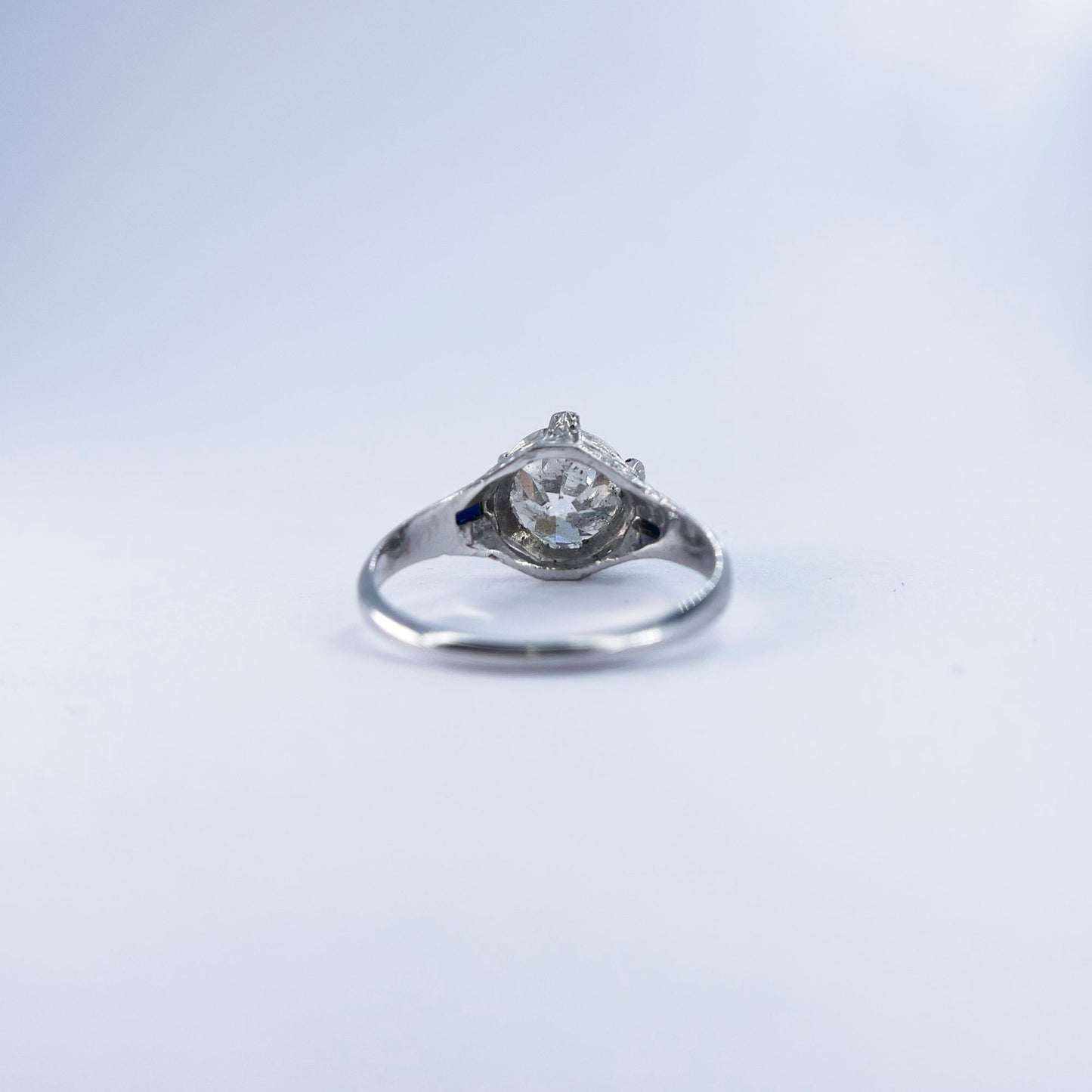 1920s Art Deco Old European Round Cut Diamond and French Cut Sapphire Ring in 20K White Gold