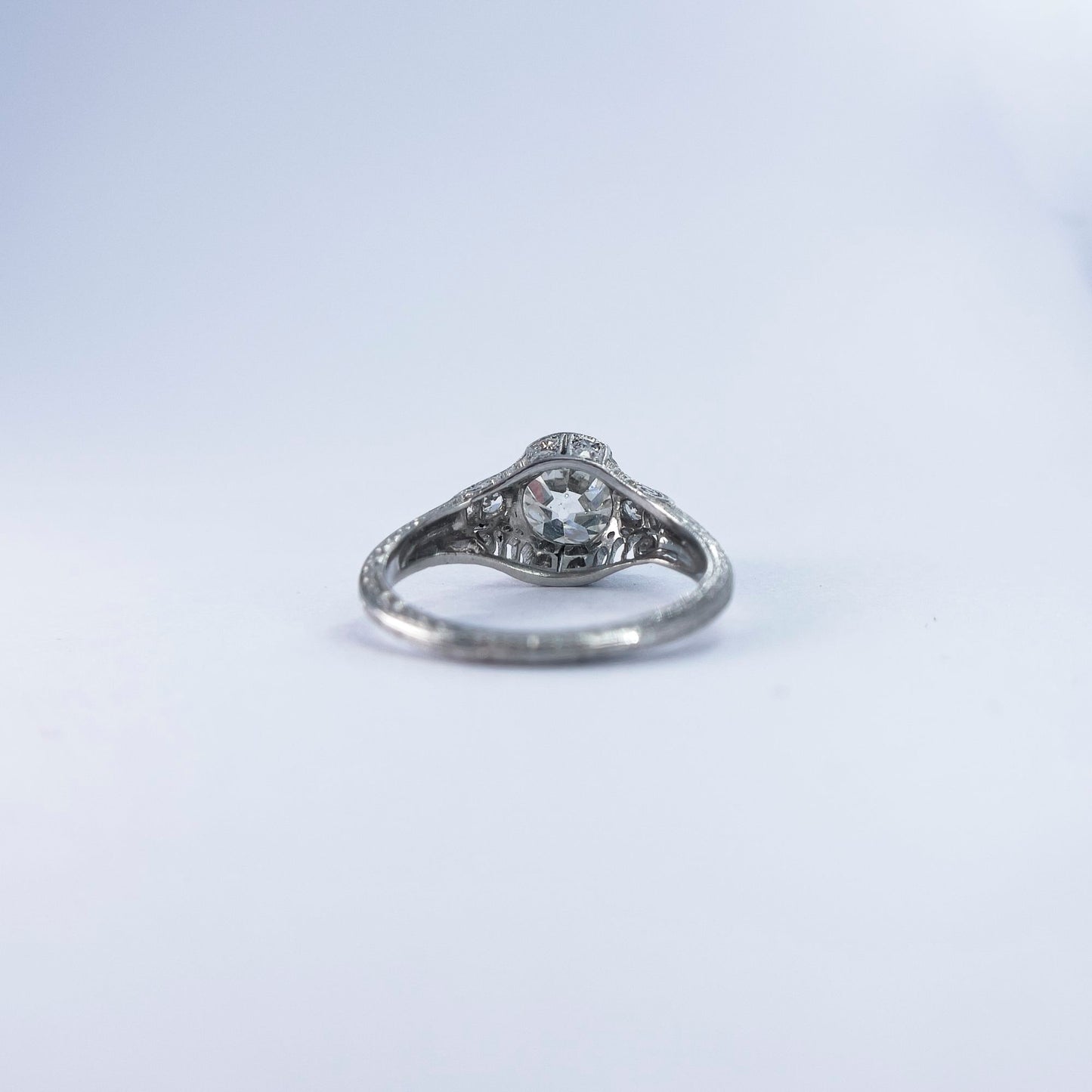 1920s Platinum Filigree Ring with Bezel Set Diamond