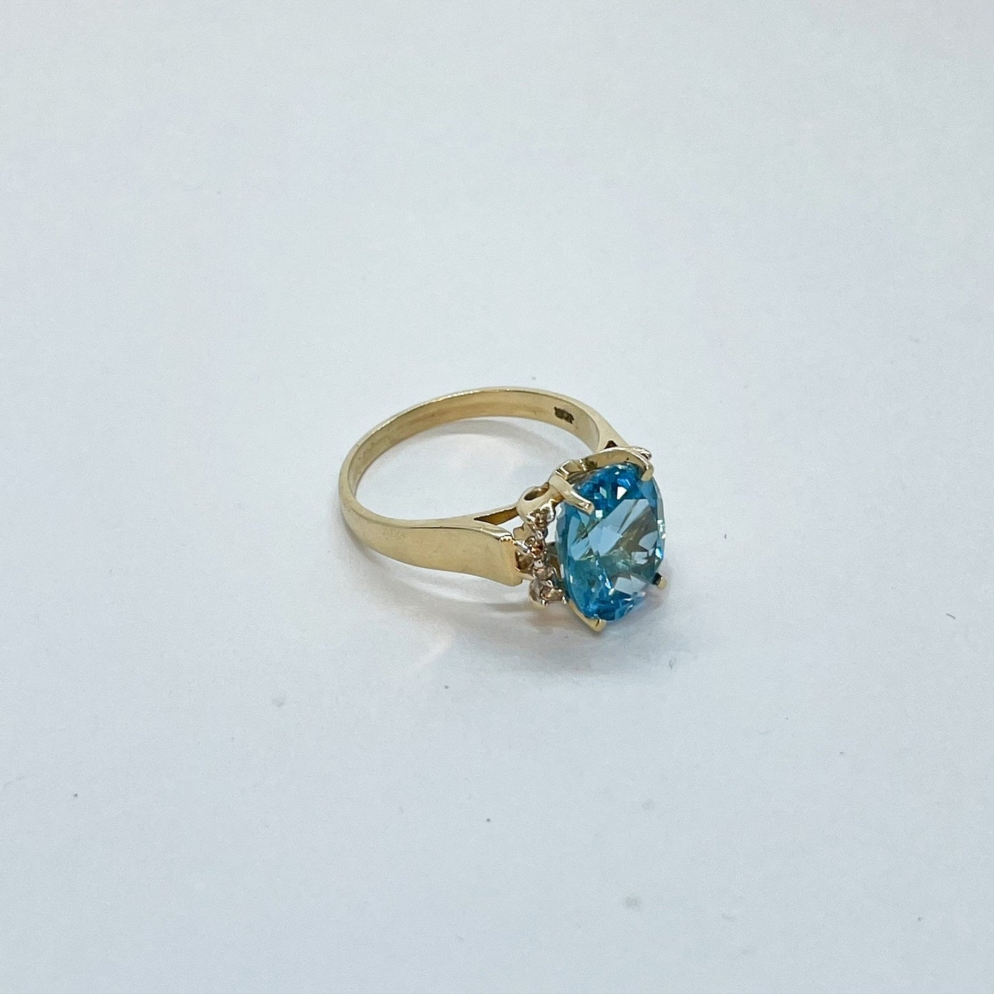 14K Blue Topaz Ring with Diamond Accents